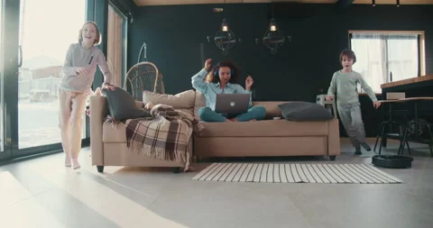 Stress on self-isolation. Young multiethnic mother talks on laptop video call Stock Footage 149075289