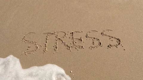 "Stress" word is written on the beach 動画素材 239690137
