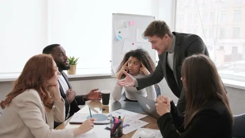 Stress at work in the office, problems at work, employees swear at the workplace Stock Footage 169657356