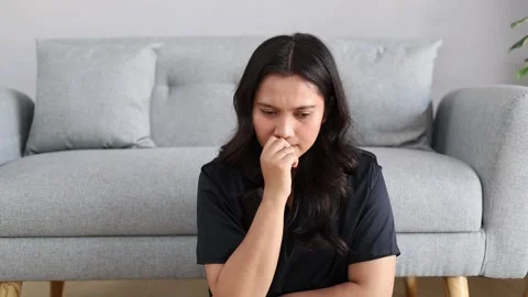 Stress, worry and face of black woman on dark background with fear, nervous and Stock Footage 345275907