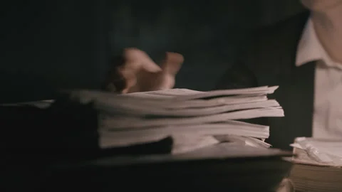 A Stressed accountant dealing with paperwork Stock-Footage 258484935