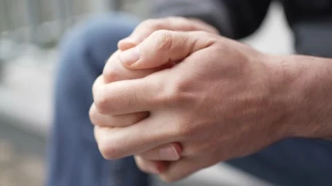 Stressed and Nervous Hands Of a Man Outdoors Closeup Stock Footage 194546242