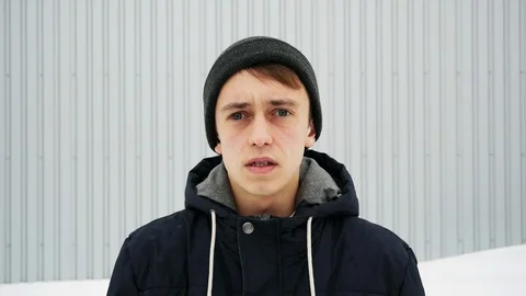 Stressed angry student screaming with open mouth, then smile, looking at camera Stock Footage 102061853