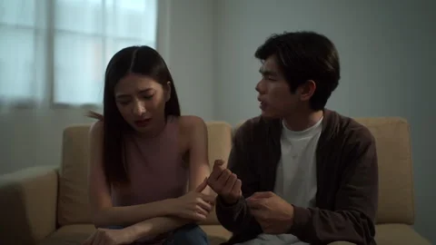 Stressed asian couple having argument with misunderstand at home, young couple h Stock Footage 283830140