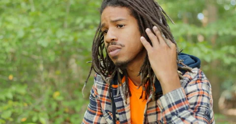 Stressed Black Man with Head Ache Mindset and Mental Health Concept Stock Footage 142234115