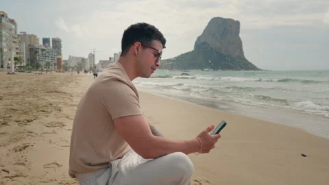 Stressed Businessman Arguing Remote Video Call Beach Executive Burnout 動画素材 334036071