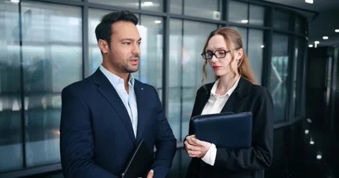 Stressed colleagues react to bad project results looking at papers Stock Footage 320083727