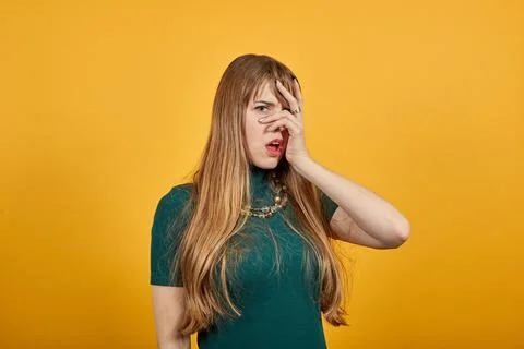 Stressed covered face with hands, crying feels desperate. Fear,shame, domestic Stock Photos