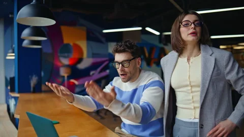 Stressed coworkers looking computer screen in office closeup. Team reacting fail Stock Footage 335313411