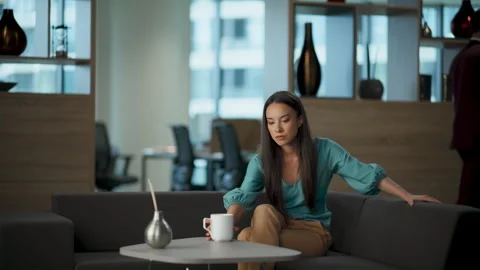 Stressed employee calming down at office. Nervous business woman panic attack Stock Footage 263932470