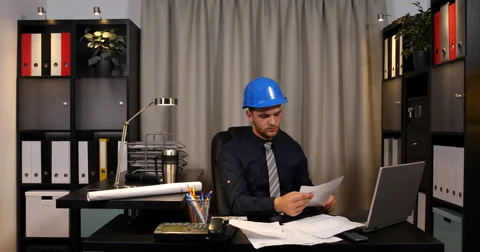 Stressed Engineer Man Examining Documents Counting Money Usd Bills Paying Debt Video stock 67998676