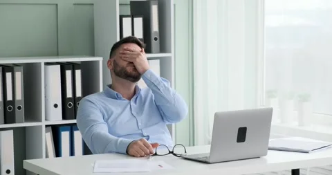 Stressed executive Struggles to Overcome Setbacks at Work Video stock 243440894