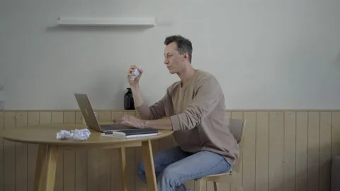 Stressed freelancer creating ideas for project. Adult male lacking inspiration Stock Footage 139593769