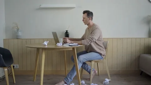 Stressed freelancer creating ideas for project. Adult male lacking inspiration Stock Footage 139593872