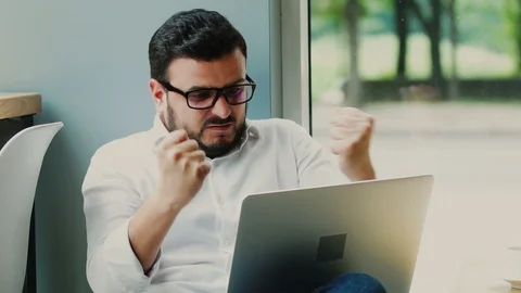 Stressed freelancer in formal shirt working with his computer Stock Footage 112990174