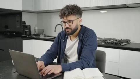 Stressed freelancer working from home on laptop Stock Footage 345129021