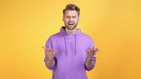 Stressed guy impressed horrible novelty isolated vibrant color background Stock Footage 169511548