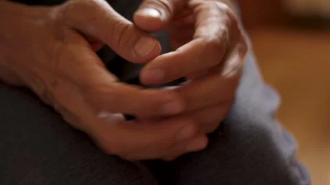 Stressed hands of an elderly man covered with vein knots Stock Footage 244713198