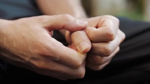 Stressed Hands Of a Young Man Closeup Outdoors Stock Footage 81150869