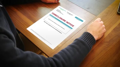 A Stressed Homeowner Looks at Generic Foreclosure Notice Stock Footage 334088772