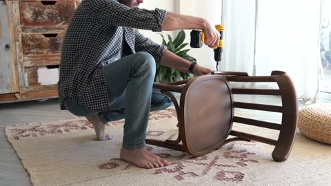 Stressed man and do it yourself furniture Stock Footage 166931696
