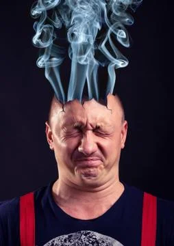 Stressed man with exploded head Foto stock