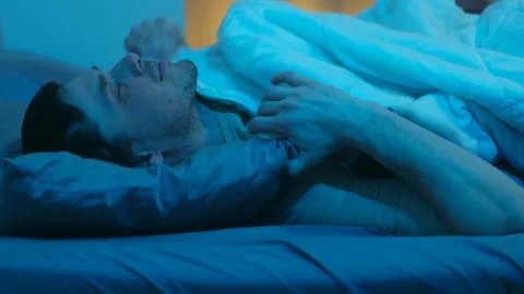 Stressed man suffering from nightmare and insomnia Stock Footage 337892726
