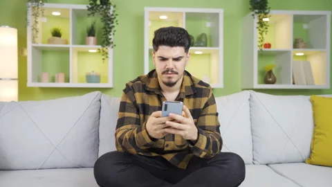 Stressed man texting on the phone. Stock-Footage 237344832