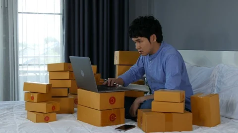 Stressed man using laptop computer and working problem to selling product online Stock Footage 130100719