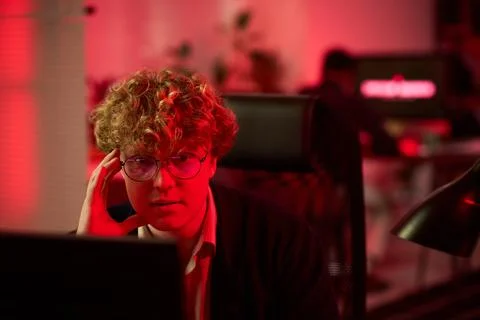 Stressed Man Working on Computer in Server Room Stock Photos