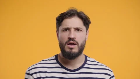 Stressed Mature Man In Panic And Disbelief On Green.Guy with eyes full of horror Stock Footage 324821212