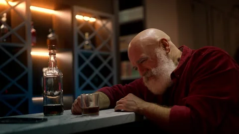 Stressed middle-aged bearded man pours liquor, trying to cope with problems Stock Footage 342520449