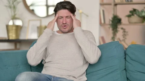 Stressed Middle Aged Man with Headache, at Home 스톡 동영상 142381916