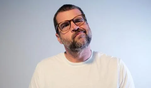 Stressed Middle Aged Man Suffering From Migraine Stock Photos