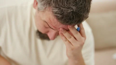 Stressed middle aged man thinking and pondering a problem Stock Footage 340931925