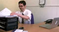 Stressed office worker looking for document HD Footage