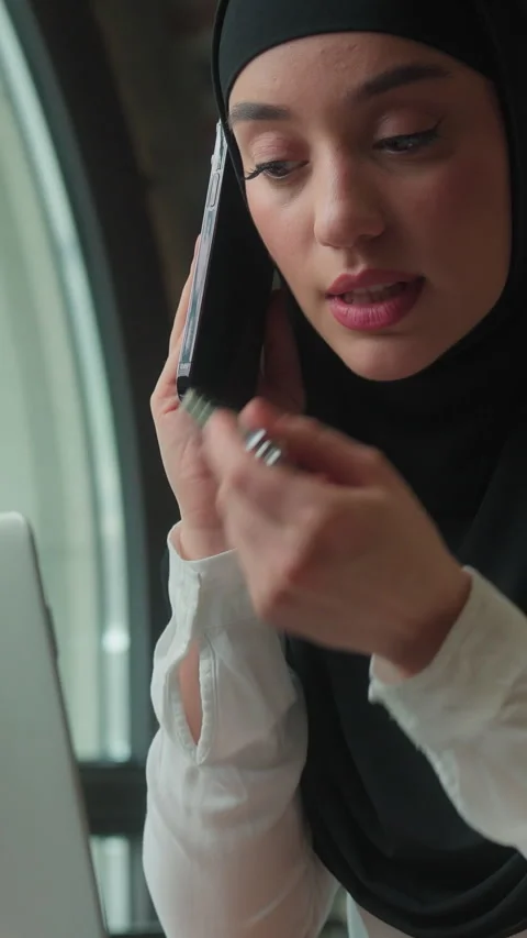 Stressed overworked multitasking muslim business woman islamic girl in hijab Stock Footage 319078463
