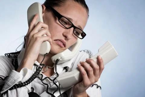 Stressed phone operator. Stock Photos