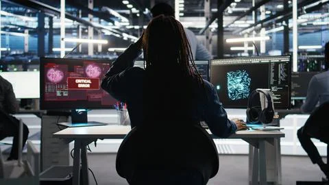 Stressed server hub admin worried by malfunctioning data analytics AI generator Stock Photos