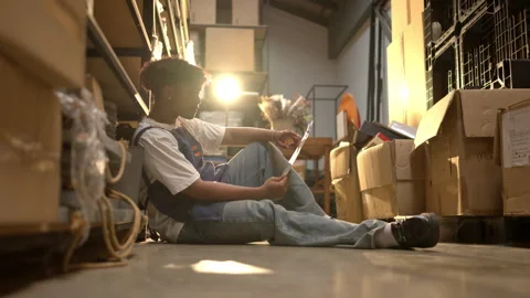 Stressed shop worker feeling pressure while working in a storage area Stock Footage 339641604
