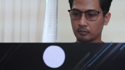 Stressed student at home studying with personal laptop computer Stock Footage 328646170