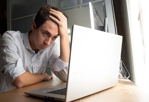 Stressed student with problem. Difficult exam, trouble, difficult connection, Stock Photos