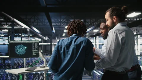 Stressed technicians in server room fighting each other after hacking attempt Stock Footage 310786657