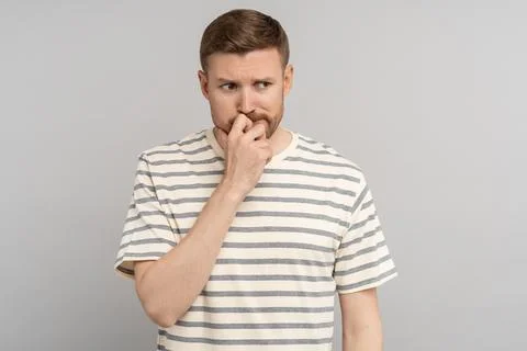 Stressed thoughtful man thinking of problem solution tired with unhappy face Stock Photos