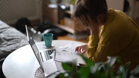 Stressed woman having financial problems with paying bills. Stock Footage 340276077