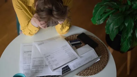 Stressed woman having financial problems with paying bills. Stock Footage 340276078
