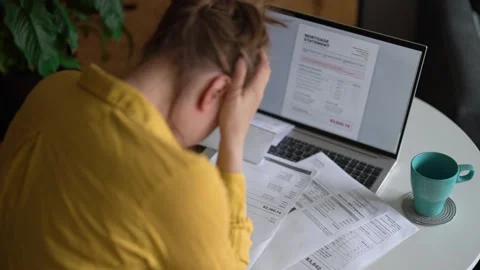 Stressed woman having financial problems with paying bills. Stock Footage 340276090