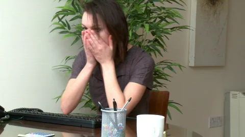 Stressed woman working at a computer Stock Footage 688123