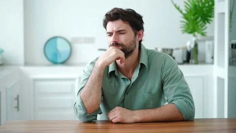 Stressed young dark-haired beraded Caucasian man suffering from psychological Stock Footage 212419844