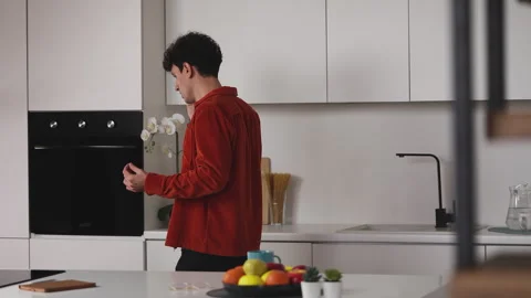 Stressed young male freelancer arguing on phone with boss at home, problems Stock Footage 341016789